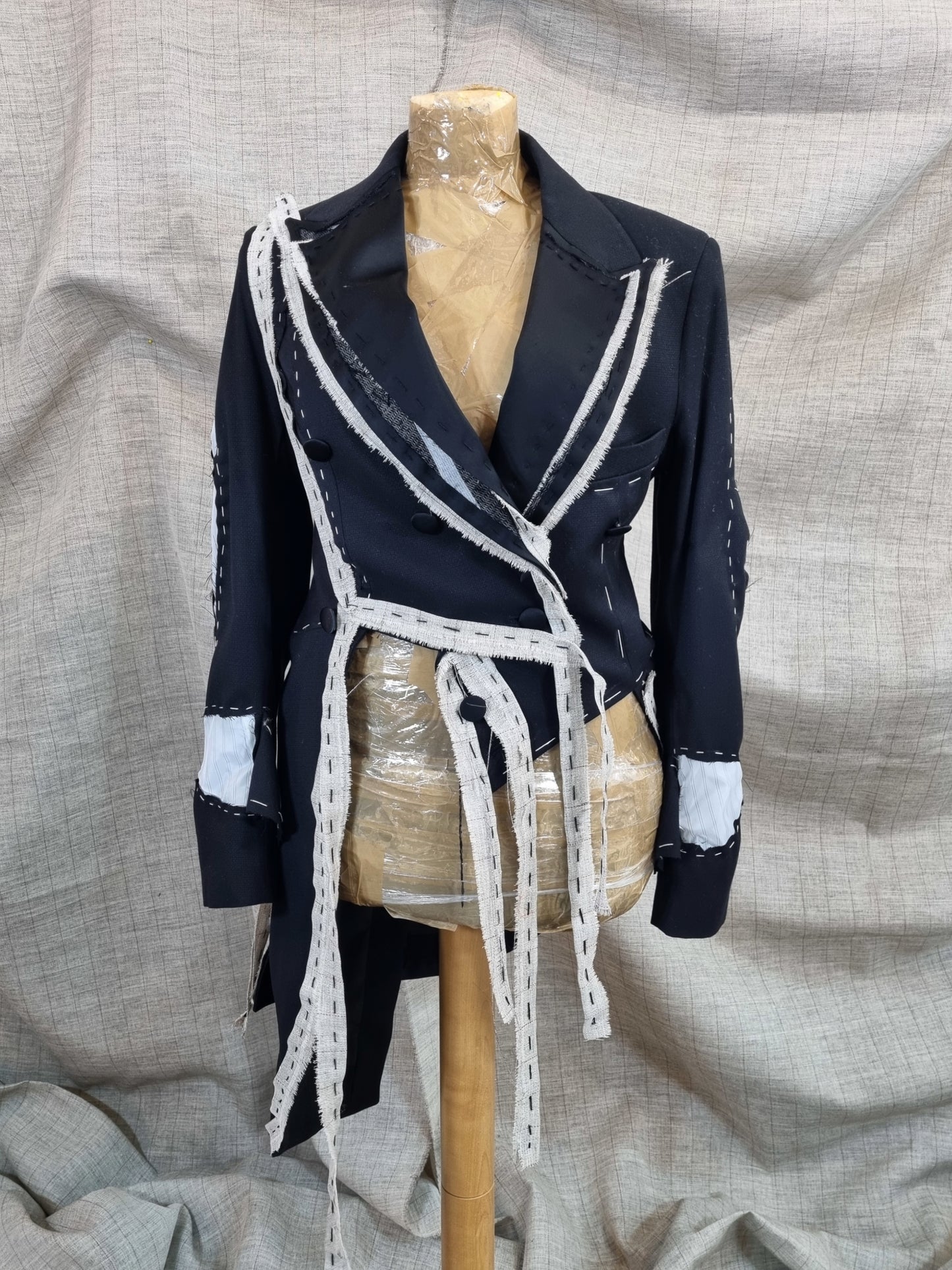 Cut-Out Tailcoat With Handmade Decorative Stitching